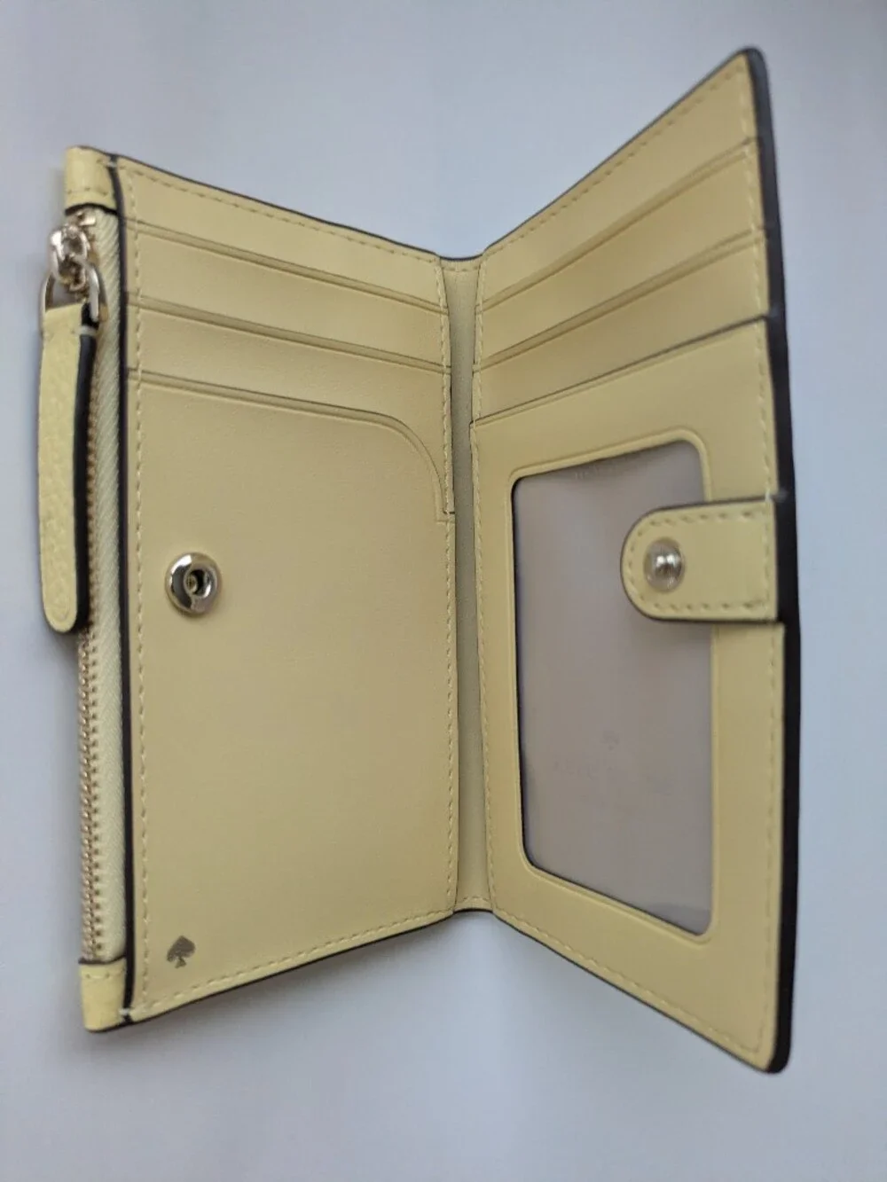 Kate Spade Small Slim Bifold in Yellow